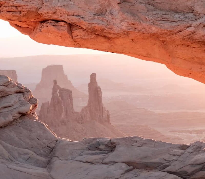 desert landscape stretches out, with sand dunes rippling under the relentless sun. The elusive glimmer of a mirage hovers in the distant horizon, symbolizing the deceptive allure of quick-fix detox kits.