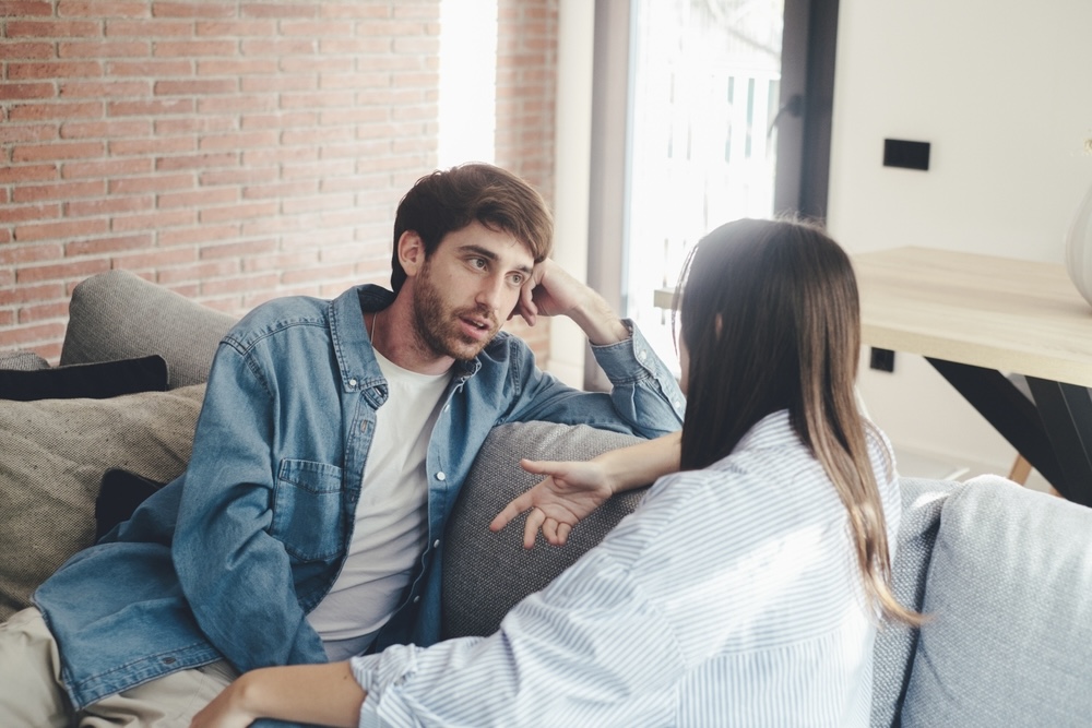 Couple talking calmly about going to drug detox 