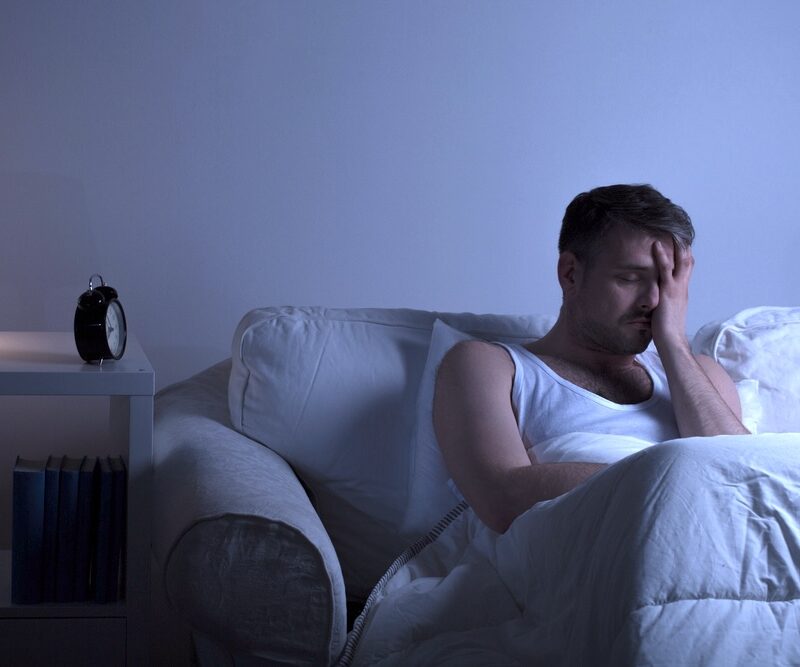 Man experiencing pain during alcohol detox withdrawal symptoms