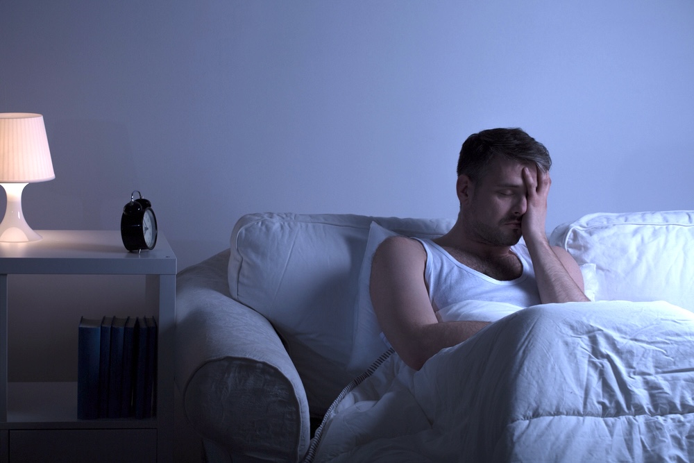 Man experiencing pain during alcohol detox withdrawal symptoms